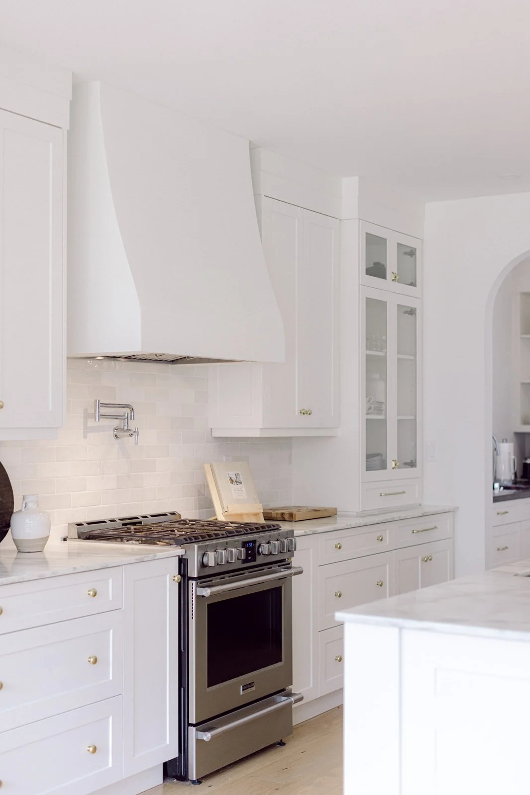White home on treed lot